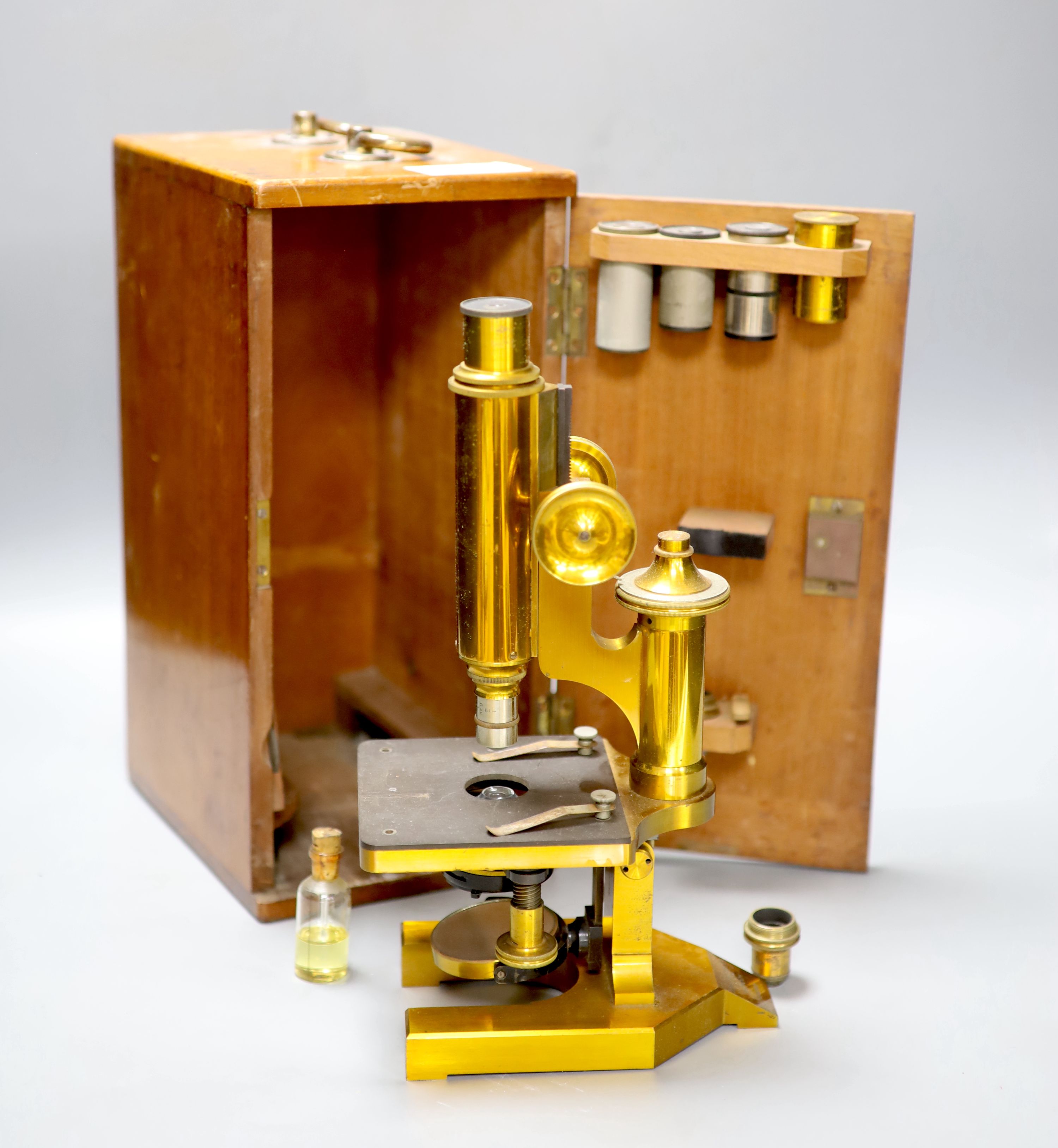 An R & J Beck Ltd brass microscope in case, serial no. 24889